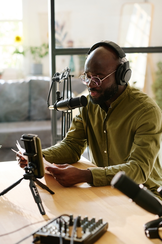 Black male Podcaster in the studio